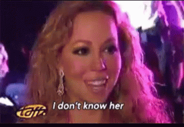 Gif shows Mariah Carey shaking her head and saying "I don't know her".