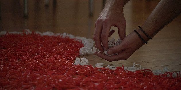 Walker Hoyt making a giant red white heart to ask Geri to marry him.