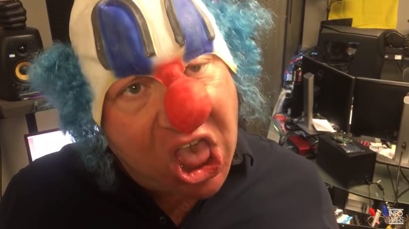 Alex Jones in an extremely ugly and creepy looking clown mask