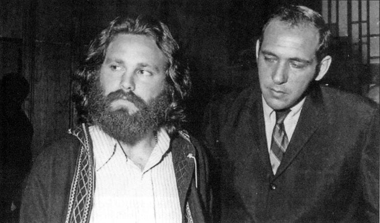 Jim Morrison and his attorney after his arrest in 1969.