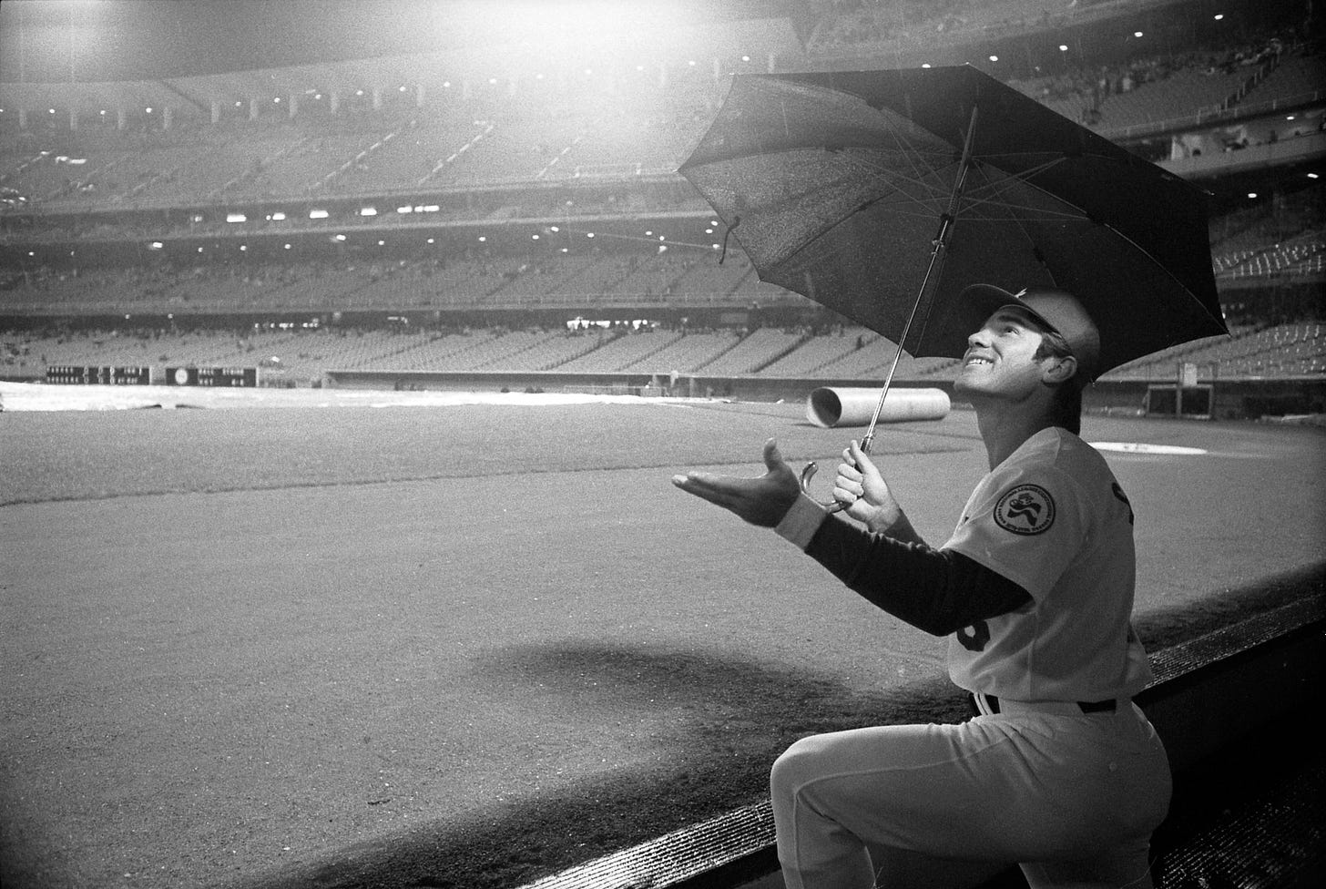 Steve Garvey watching rain fall at Dodger Stadium