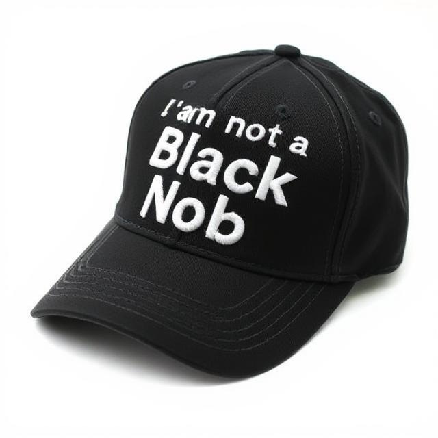 https://images.deepai.org/art-image/c23f076555f942bdb64cc3399dcddc31/black-baseball-cap-with-i-am-not-a-black-nob-written-.jpg