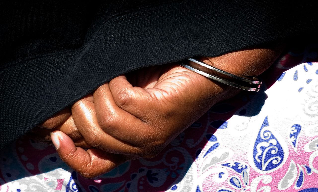 Peoples in handcuffs on April 18, 2013.