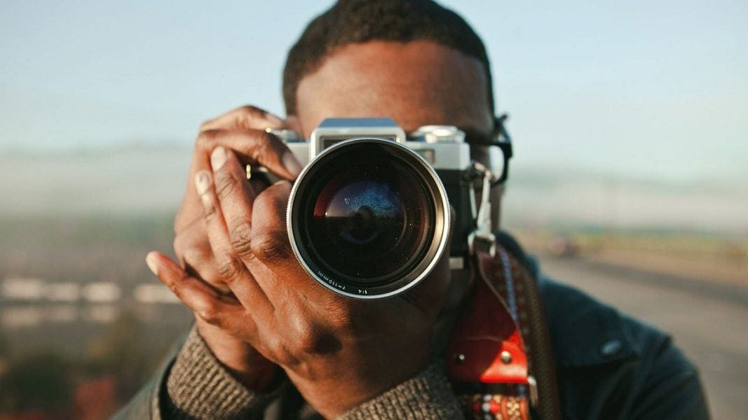 man taking photo with wide angle camera for movie tv tech geeks