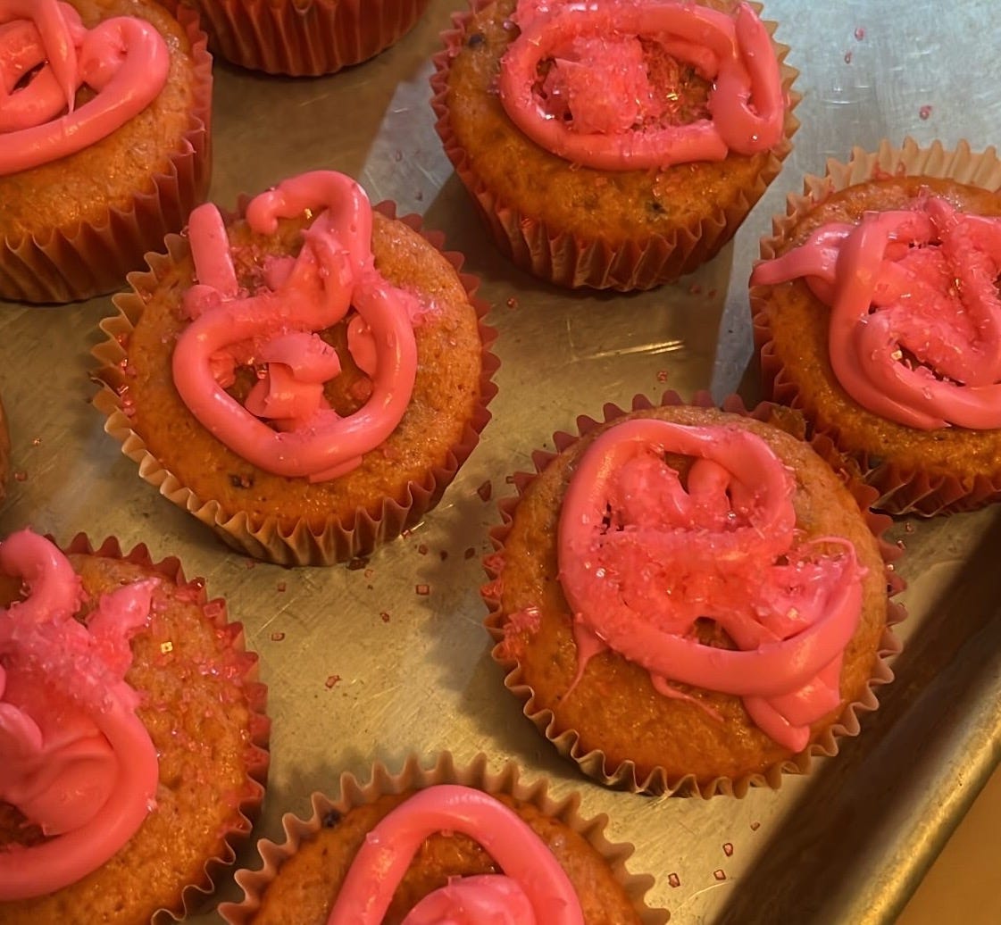 Pink cupcakes with pink icing and pink glitter sprinkles