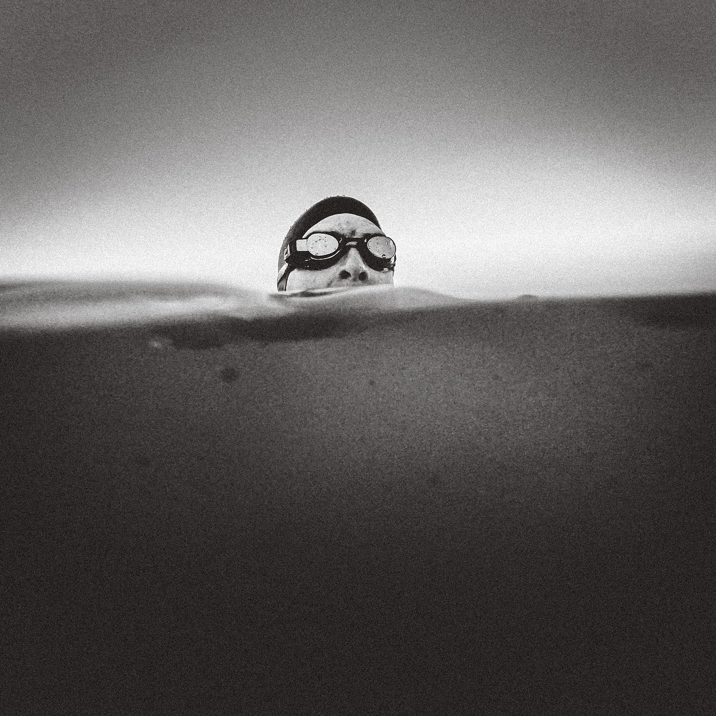 Sean Openshaw floats in Lake Mary during a swim session in the Flagstaff, Arizona lake.