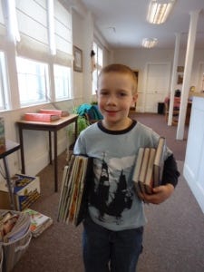 a boy, reading books!