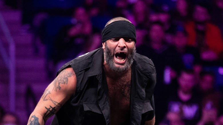 Mark Briscoe shouting while performing for AEW