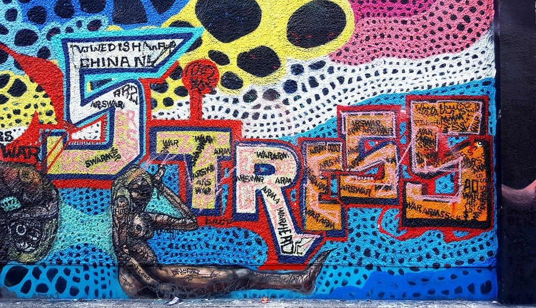 Graffiti-like art mural with bright colors spelling out the word Stress