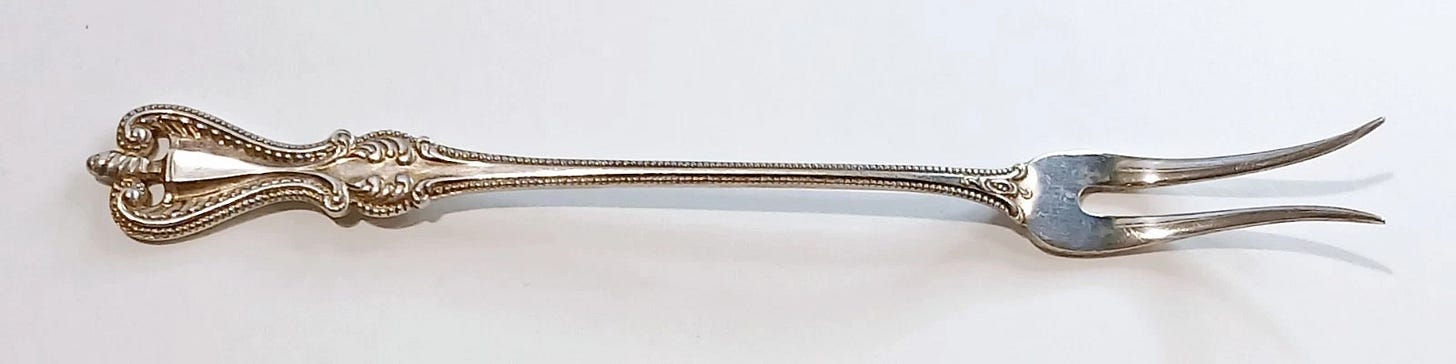 Olive fork, two prongs. Olive fork, two prongs.