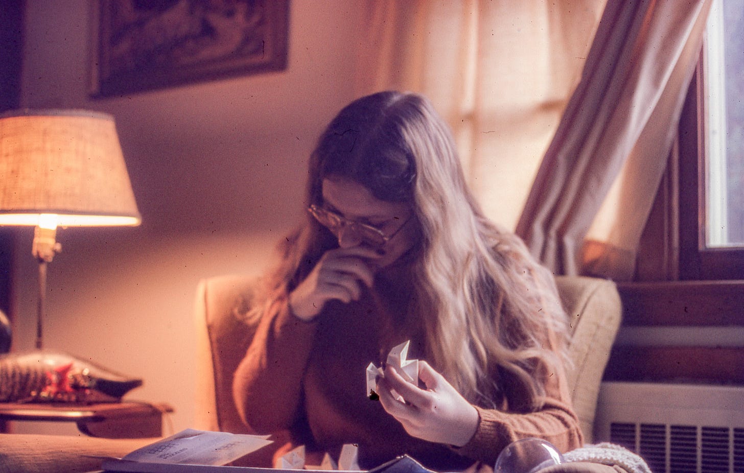 Pat Poltrack working on a puzzle in Fairfield, CT (1960s)