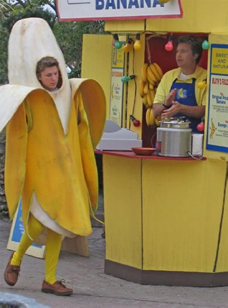 Still from Arrested Development with George Michael in the banana costume outside Bluth's Frozen Bananas.