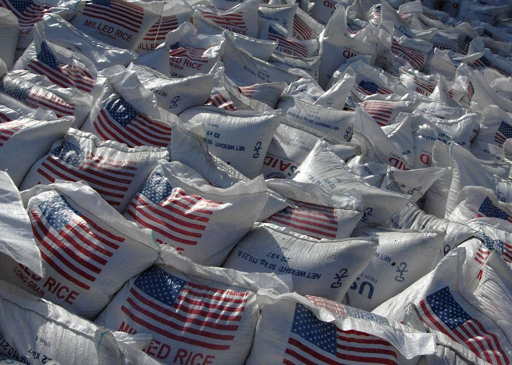 Bags of rice are staged for distribution at an aid distribution point in Port-au-Prince, Haiti.