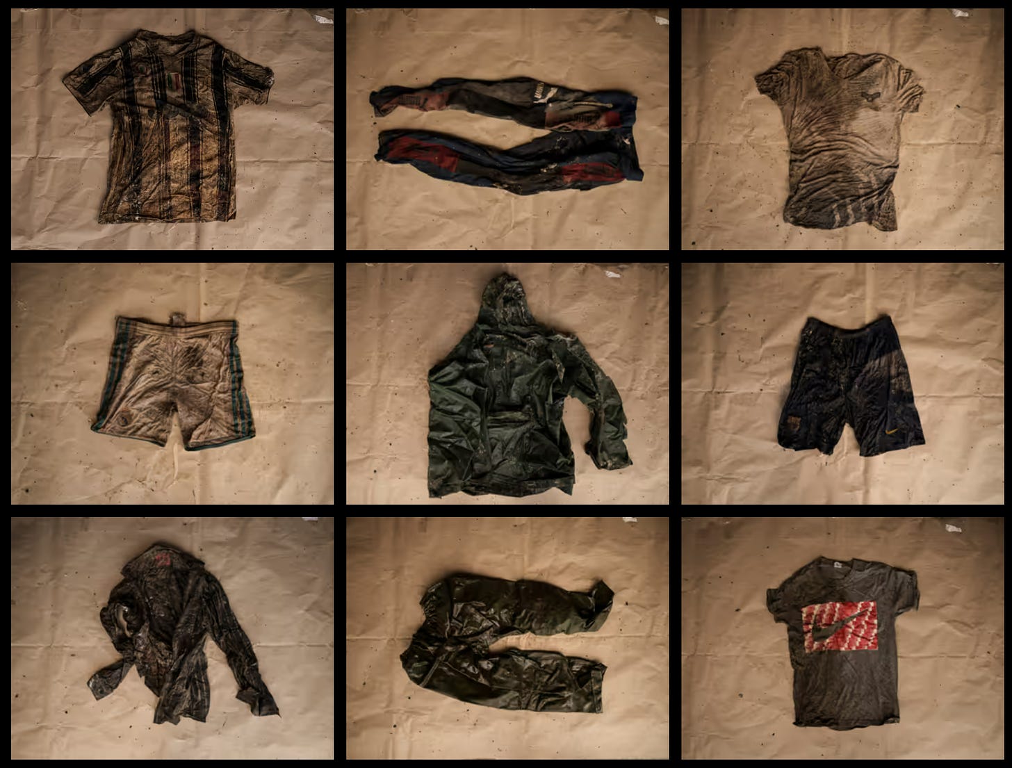 A collage of dirty jackets and shorts worn my Mauritanian migrants 