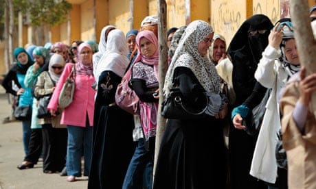 Egyptian women wait to cast their vote in Cairo