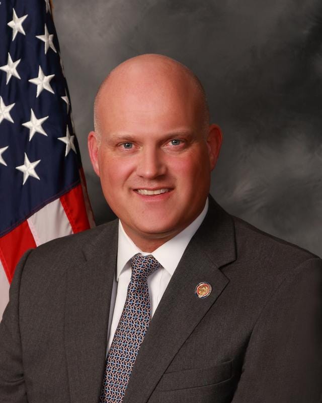 An official Statehouse portrait of Scott Wiggam, Republican State Representative from Wooster