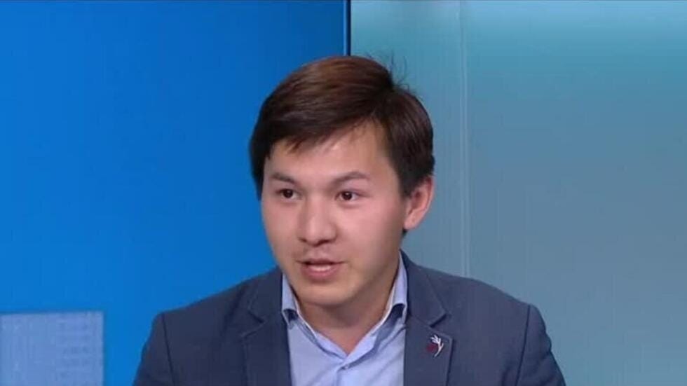 A screen capture showing French-Afghan journalist Mortaza Behboudi.
