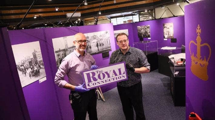 South Canterbury Museum’s curator of social history Chris Rapley, left, and curator of documentary history Tony Rippin set the Royal Connection exhibition this week, in conjunction with King Charles’ coronation on Saturday.