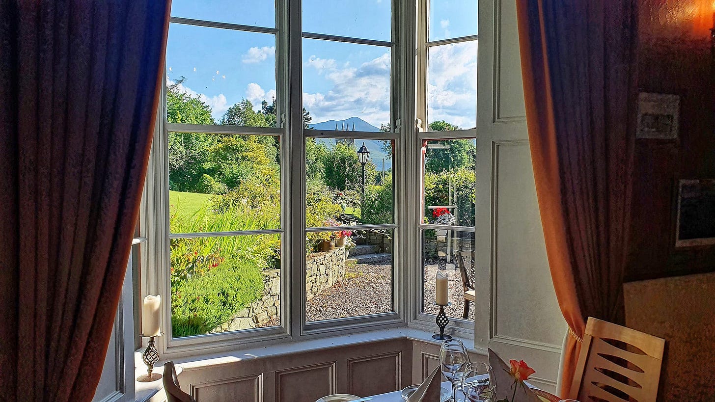 A glimpse of the church tower from a table in the dining room