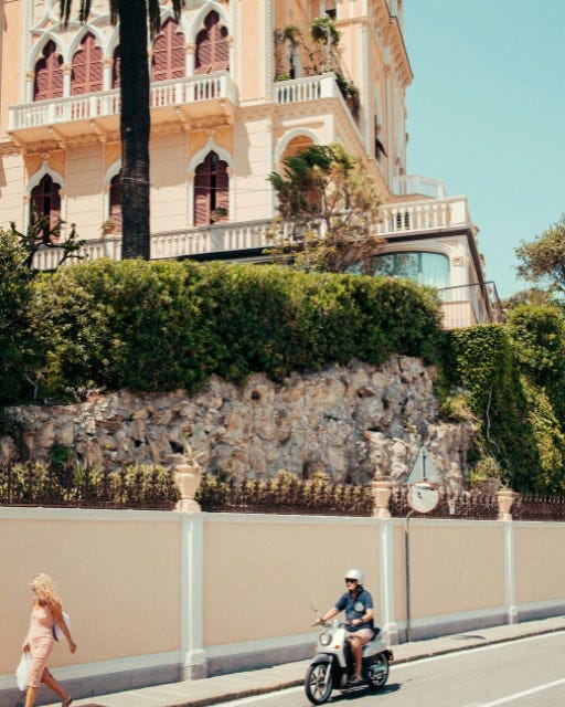 May be an image of 2 people, scooter and Camogli