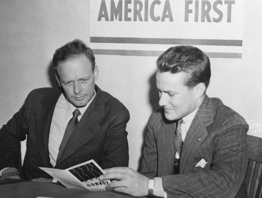 Col. Charles A. Lindbergh (left) with R. Douglas Stuart, Jr., National Director of the America First Committee, when the aviator enrolled in Chicago as a member of the AFC.