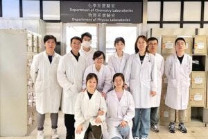 Professor Ly (back row, fourth from left) and her research team.