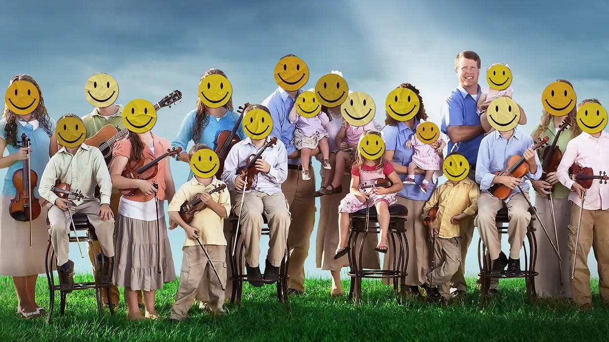 a photoshopped photo of a large group of people of different ages against a dark blue sky and on the grass. all of their heads are covered with fake yellow smiley faces.