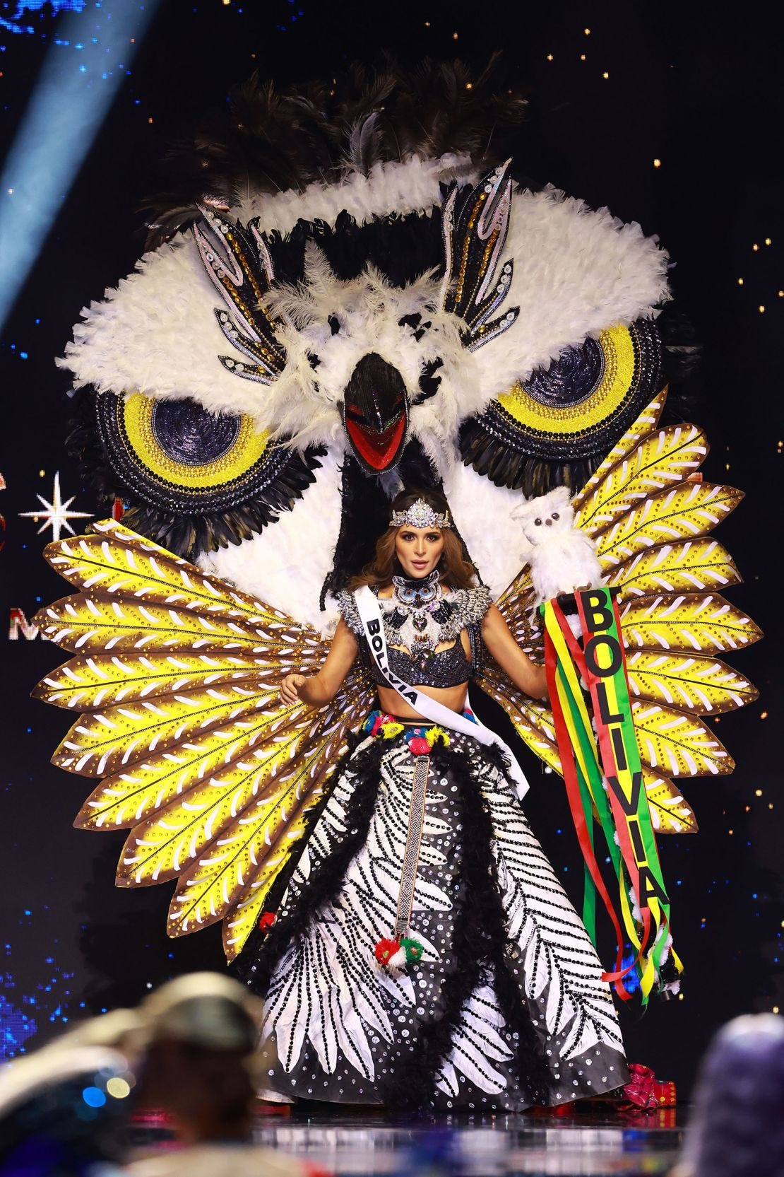 Miss Bolivia, Juliana Barrientos, took the stage in a shaman-inspired look — complete with a stuffed toy owl.