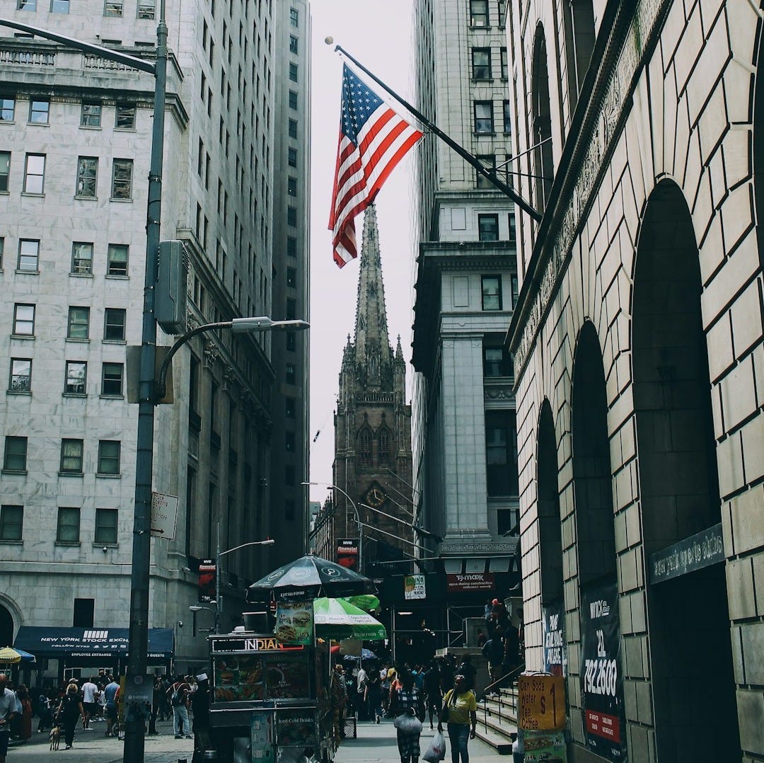 US flag beside street US flag beside street