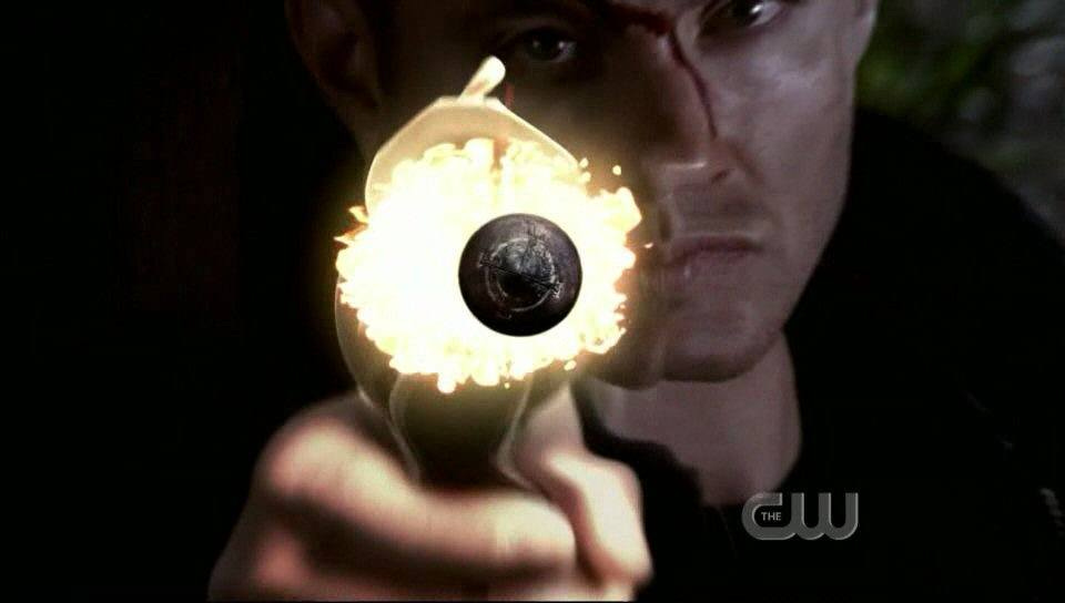 Supernatural all hell breaks loose Dean Wincheseter firing gun close up