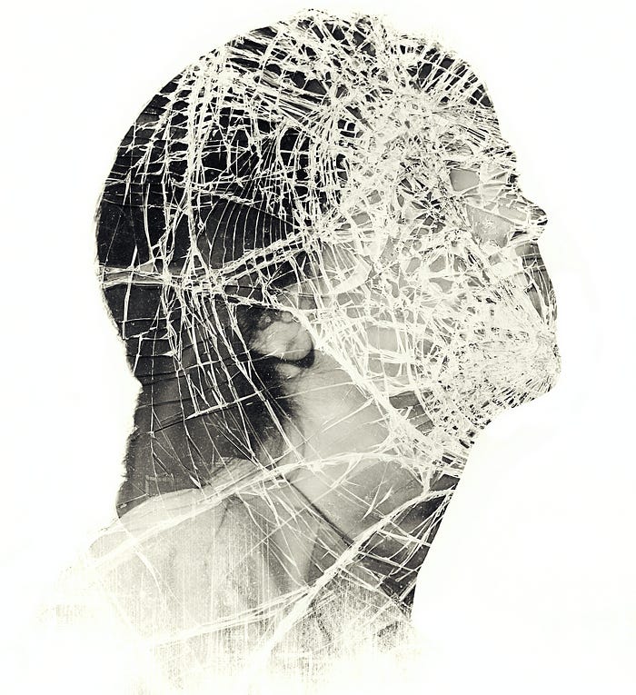 A multiple exposure photo of a woman’s face that appears to be shattered.