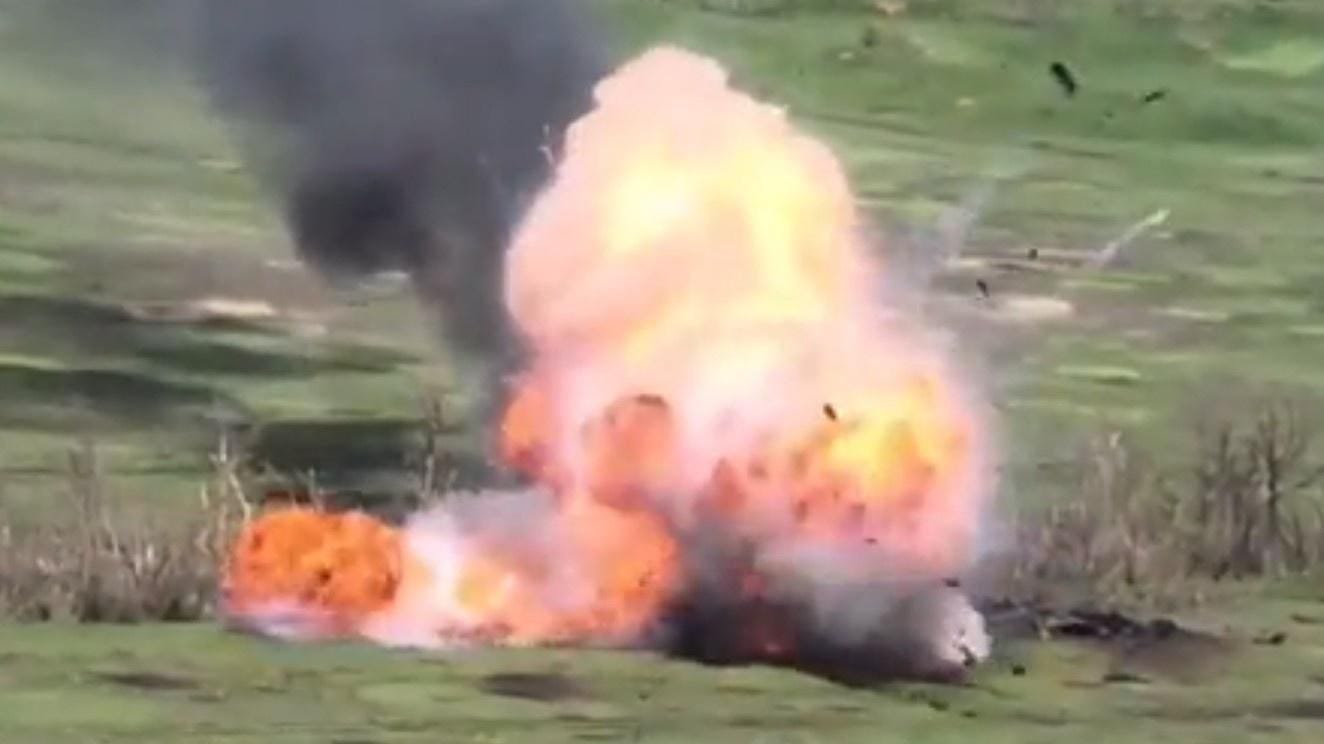 A Russian tank explodes in a Ukrainian drone strike outside Nevel's'ke.