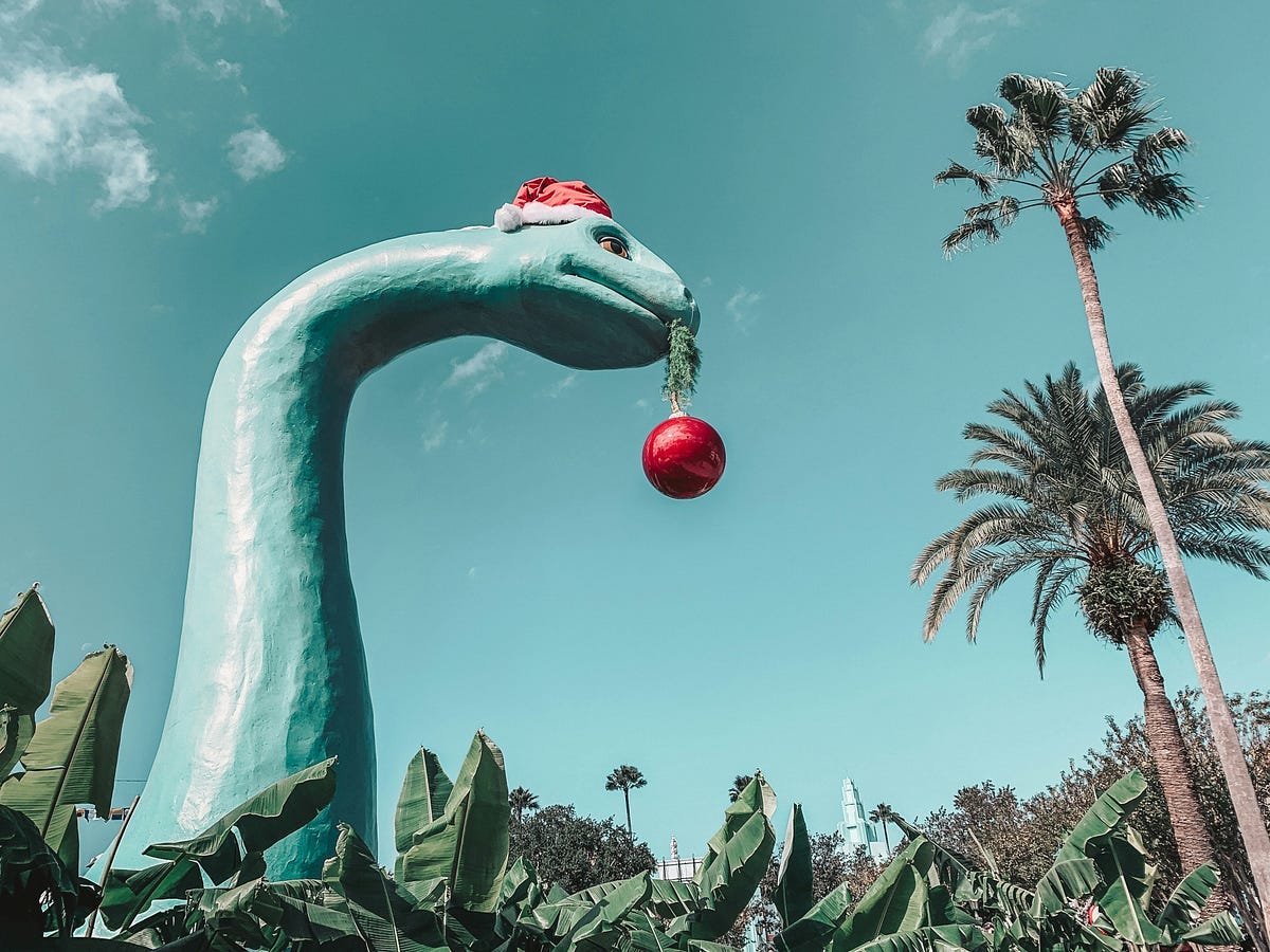 Dinosaur with a red ball in its mouth Dinosaur with a red ball in its mouth