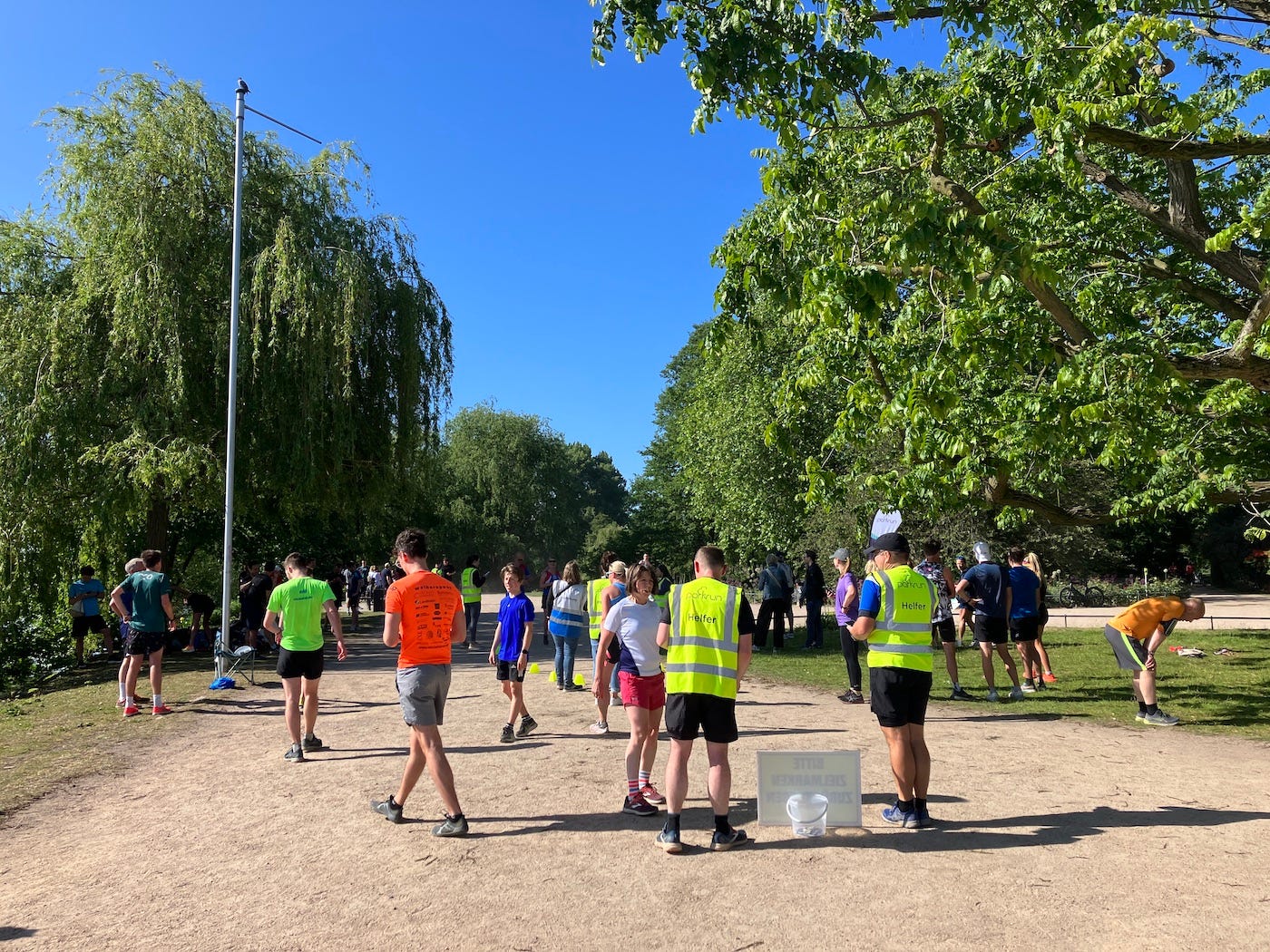 Runners and volunteers at the finish