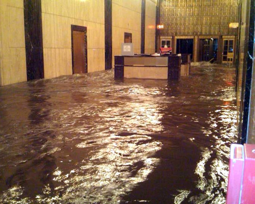 The hurricane&rsquo;s storm surge flooded the central office of Verizon on West Street in Lower Manhattan on Monday night.