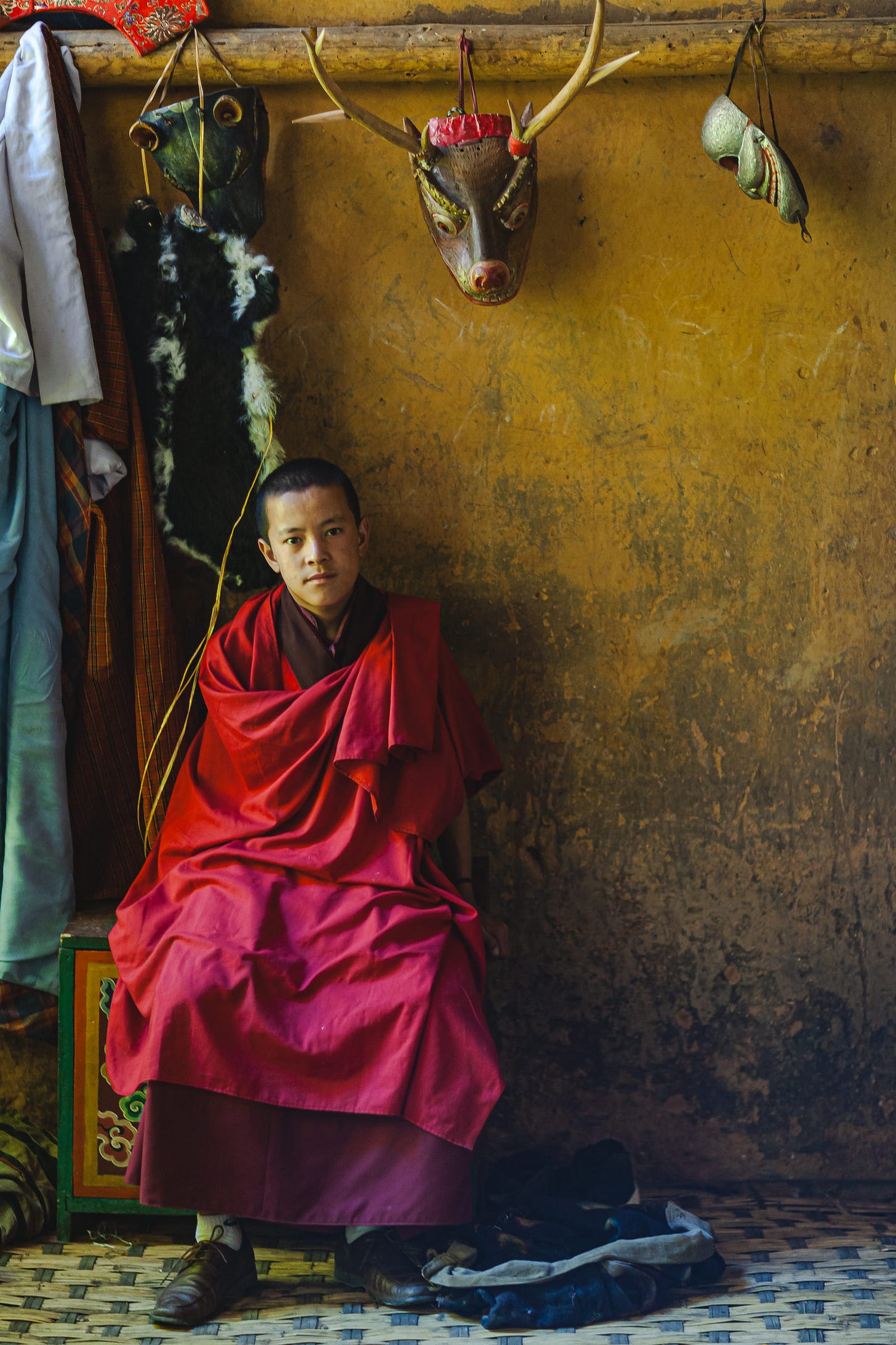 Sitting in the Dressing Room at a Tsechu (festival). 1/30, f/1.2, ISO400, -1 stop, 85mm