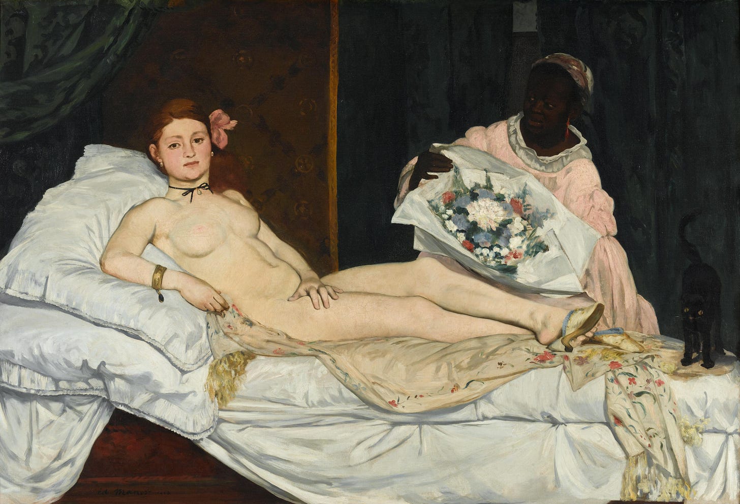 a nude white woman looks directly at the viewer as she is reclined on a bed and a black maid presents a large bouquet to her