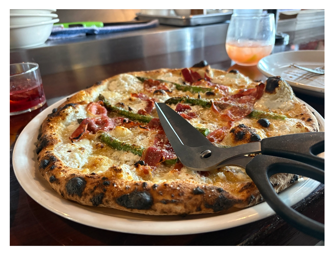 Pizza with scissors