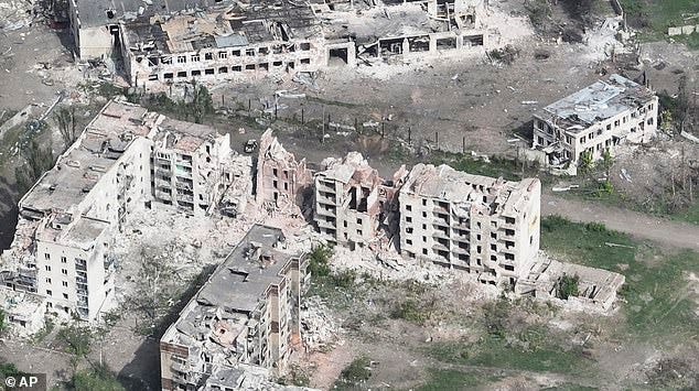 This photo taken from a drone video provided by Ukraine Patrol Police, shows devastation in Chasiv Yar, an eastern Ukrainian city Russia is assaulting, Ukraine, April 29