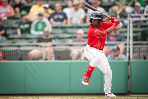 Eddinson Paulino of the Boston Red Sox bats during the Spring Breakout game against the Atlanta Braves at JetBlue Park at Fenway South on March 16,...