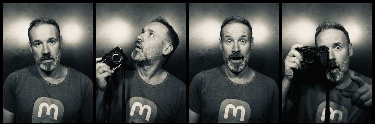 Four photos in a strip showing photos of me in a Mastodon tshirt taken in a 3 Euro Photo Booth in the Louvre.