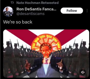 DeSantis 2024 staffer Nate Hochman retweets a video displaying Ron DeSantis imposed over a Nazi symbol and marching US Marines carrying rifles