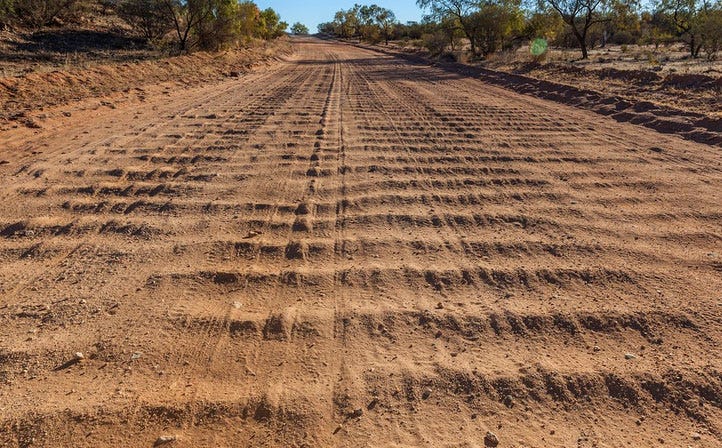 A severely washboarded section of road