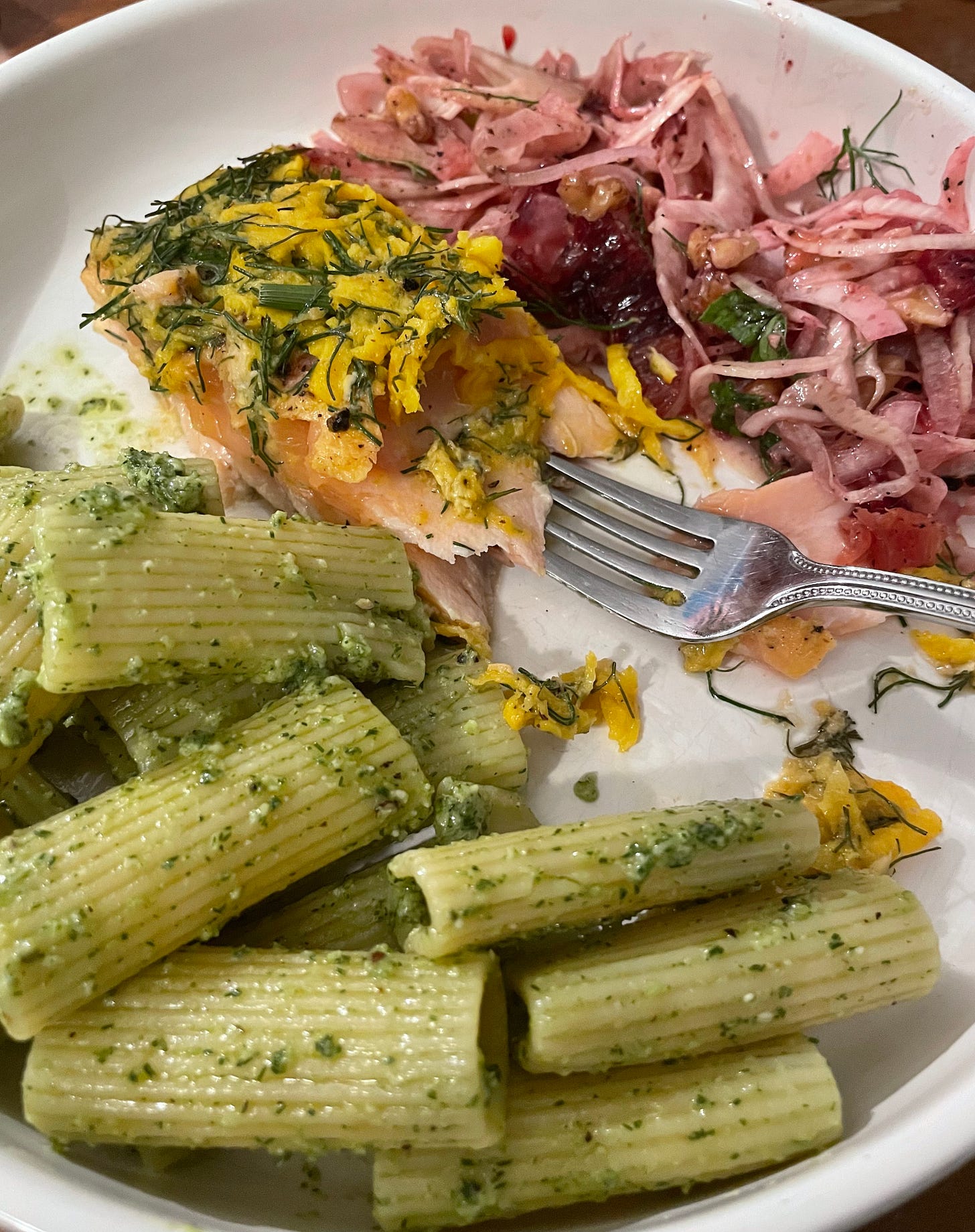 rigatoni with pesto, salmon topped with grated golden beets and fennel fronds, fennel and orange salad