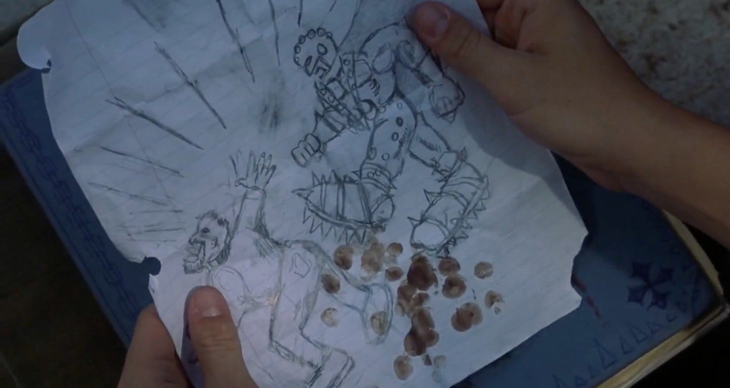 Movie still from The Dangerous Lives of Altar Boys. A hand holds up a drawing of a guy getting his butt kicked, with poop coming out of him.