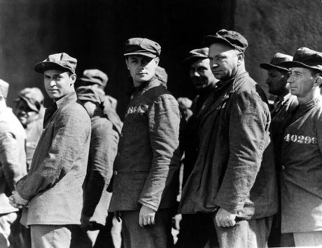 Chester Morris, Robert Montgomery, & Wallace Beery in a scene from The Big House