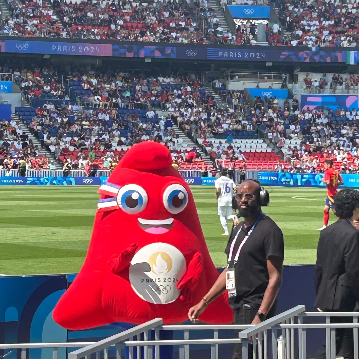 The 2024 phrygien bonnet mascot of the Olympic games greets fans at a football match in Paris