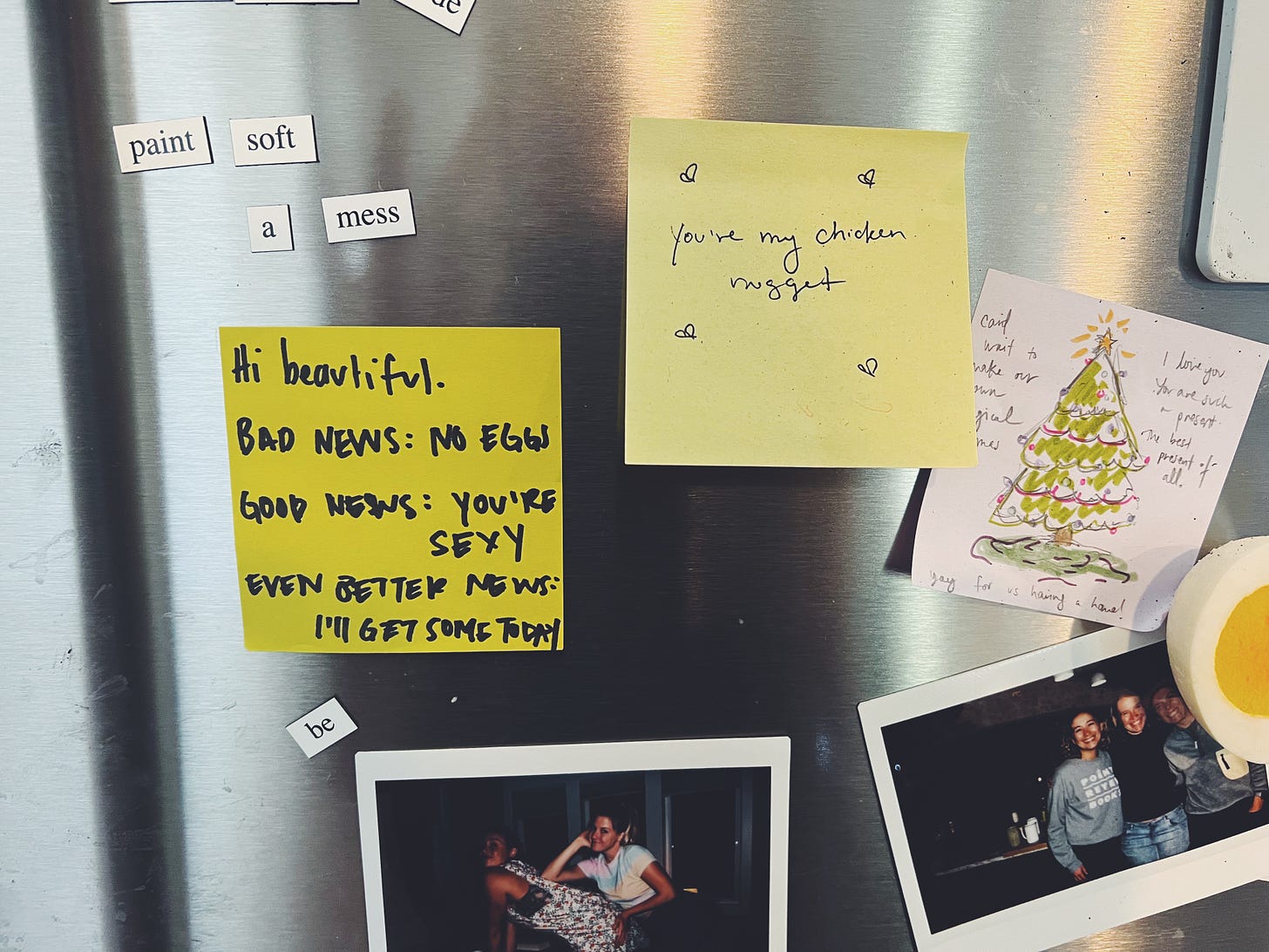 Fridge with sticky notes we've written to each other