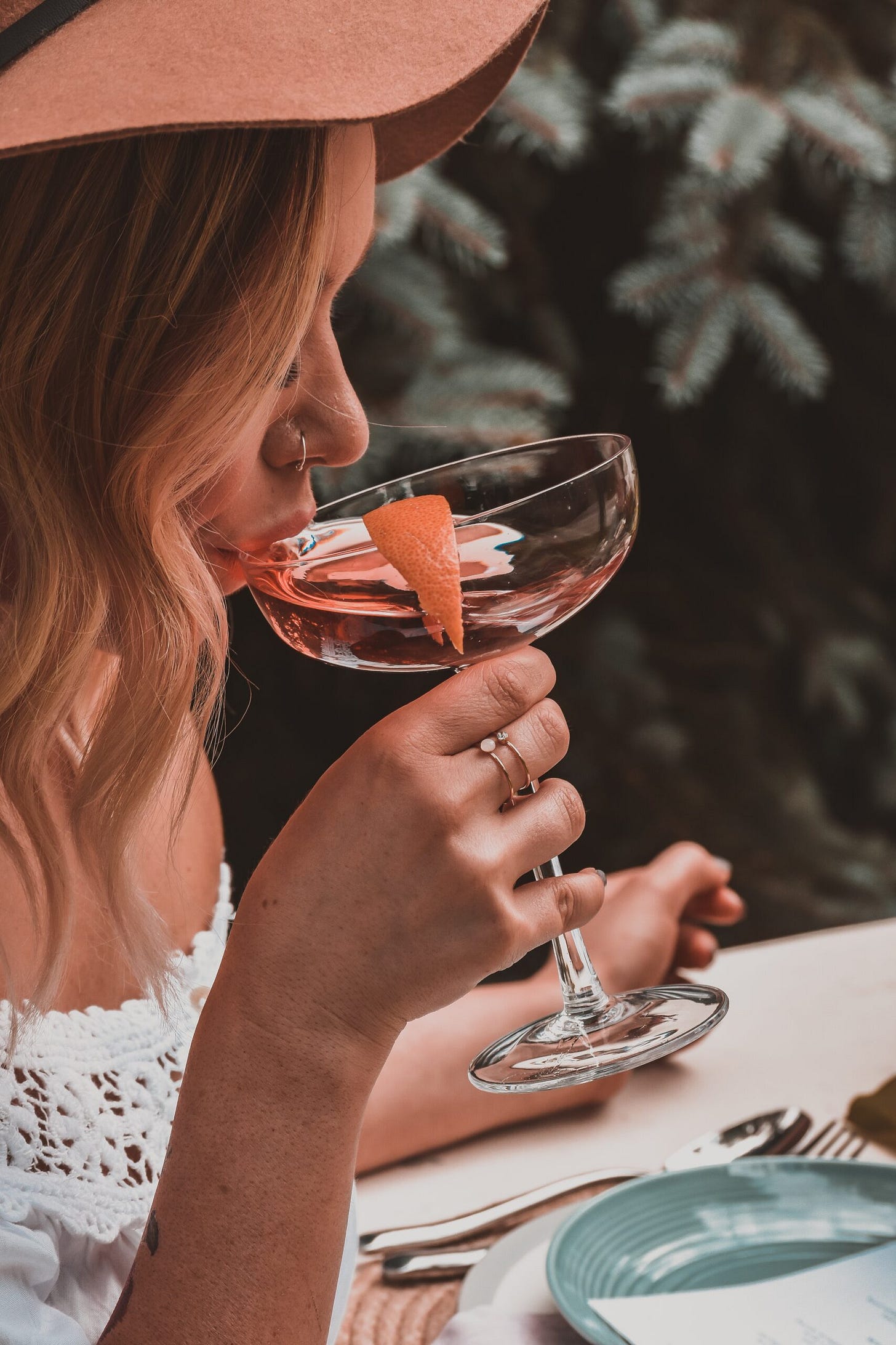 woman drinking rose