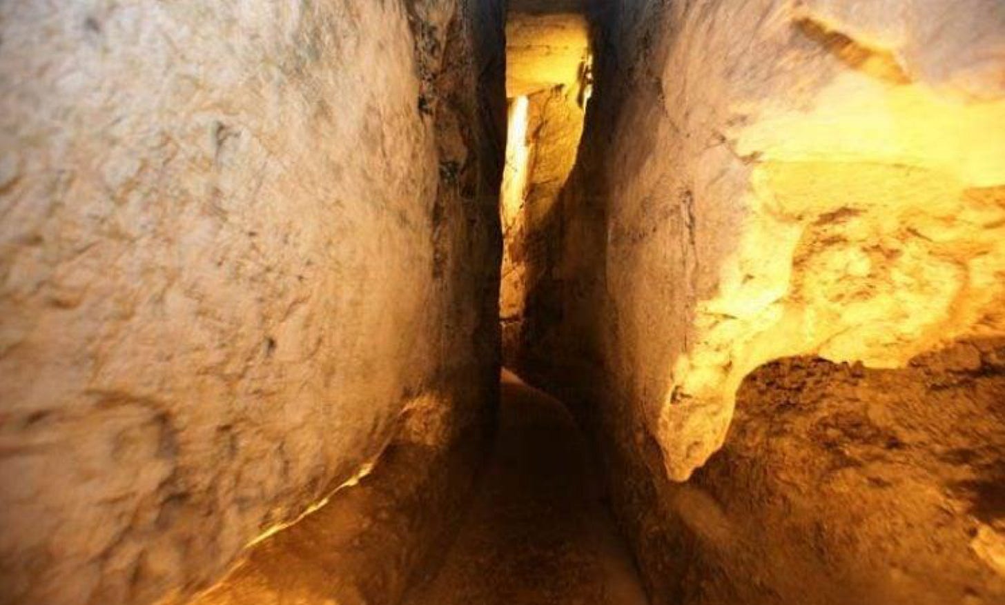 Narrow passage cut through rock below and alongside Kotel (the western wall of the Temple of Solomon)